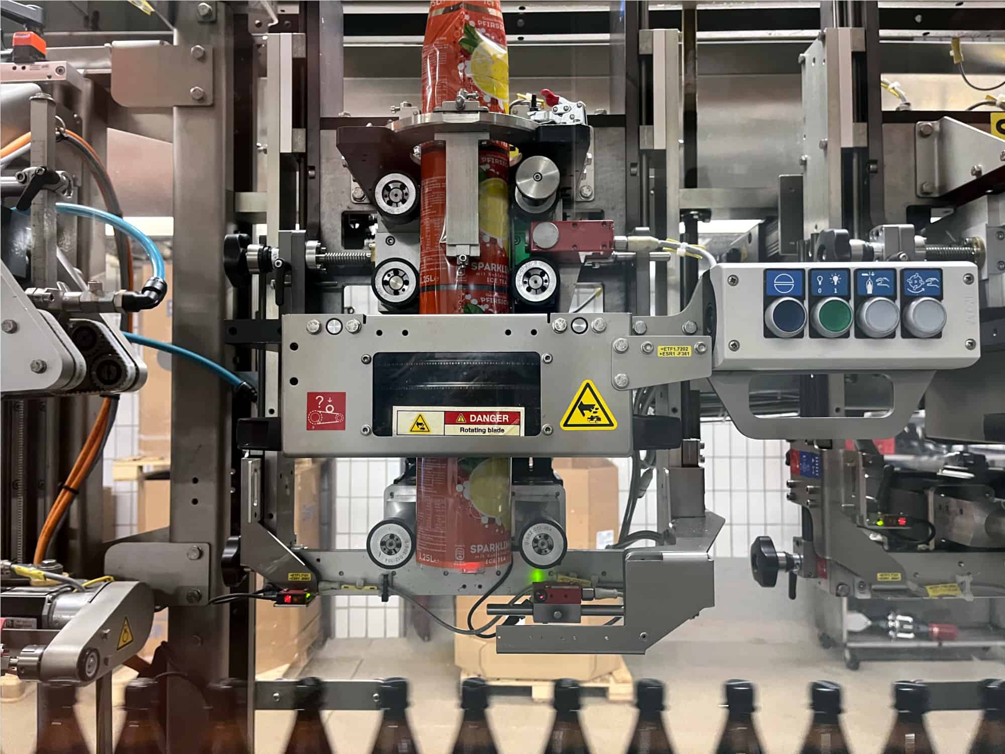 Détail de Krones Sleevematic M2 + Shrinkmat 5000